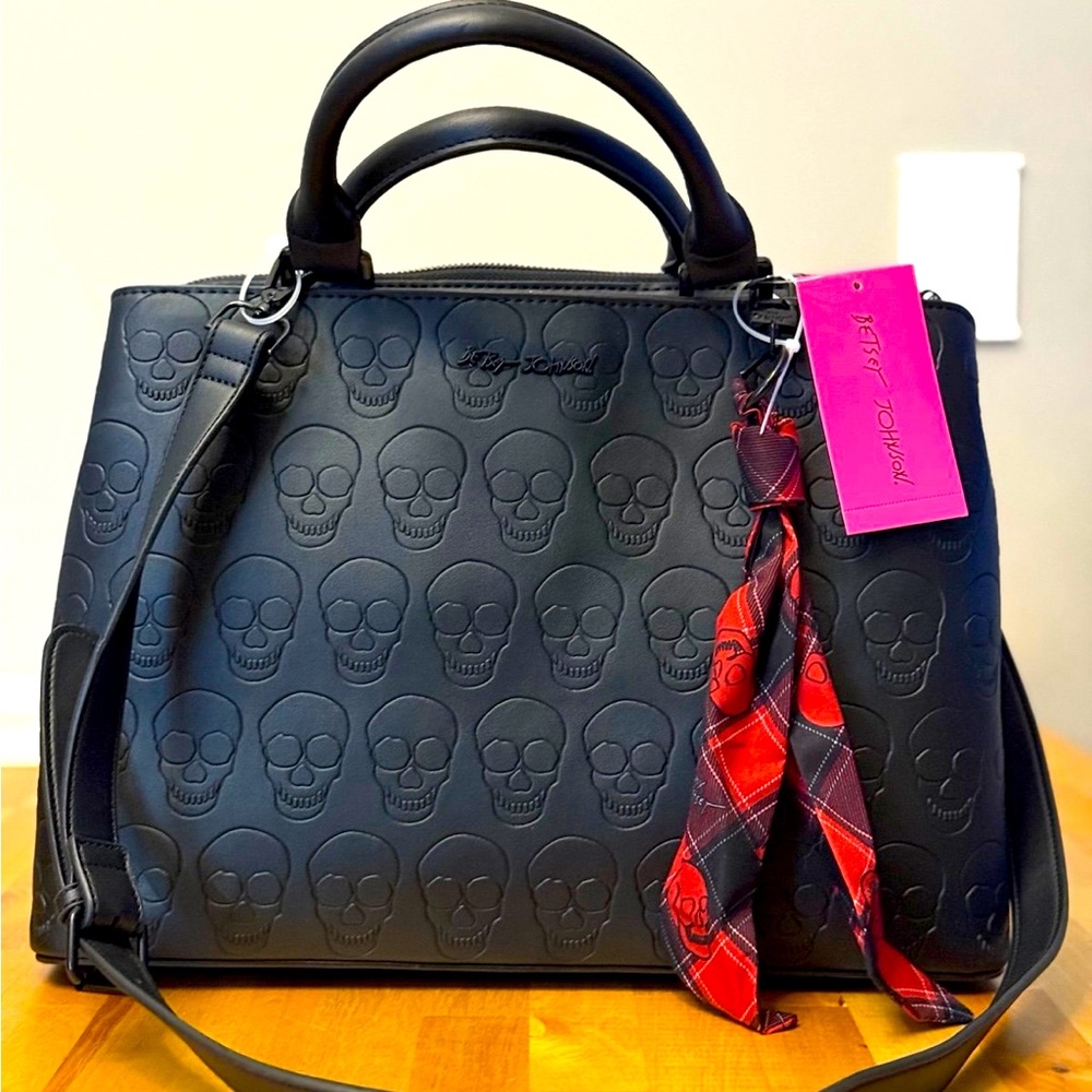 NWT Betsey
Johnson Skull Top
Handle Crossbody Tote in Black with Scarf $100